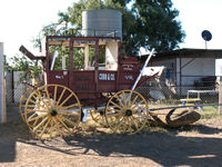 with a Cobb & Co coach outside